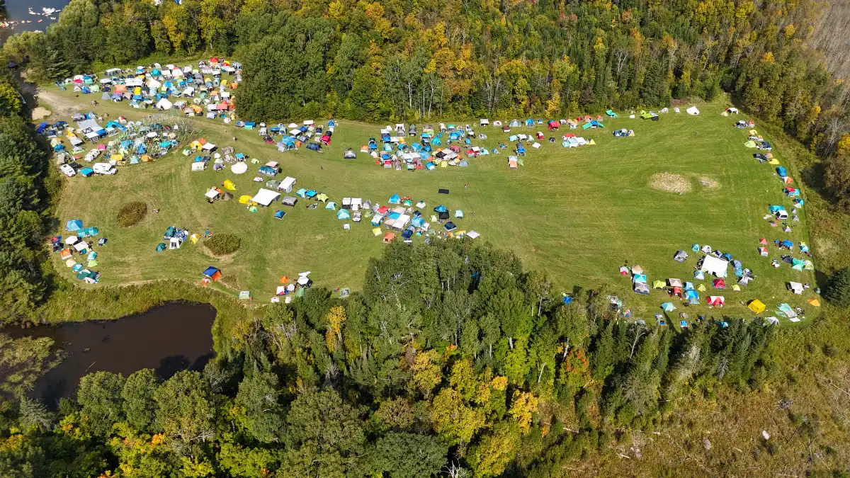 A drone over the main camping field past CRASH