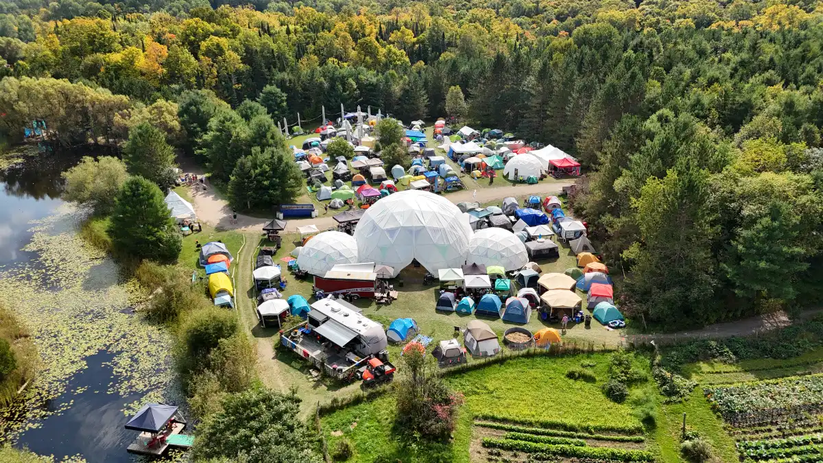 Drone pic of camping and large geodesic dome