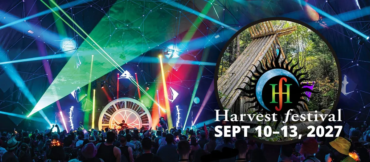Harvest festival tickets: vibrant stage lights and happy crowd at outdoor music event