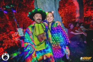 couple-rave-dressed-by-zac-mac Couple in colourful LED outfits at an outdoor music festival